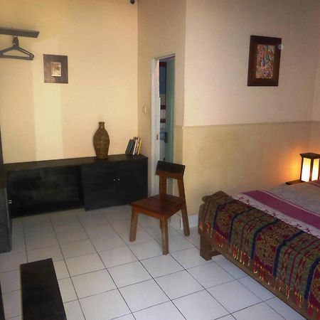 La Casa Homestay Сенгиги Стая снимка